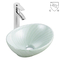 Elegancka i elegancka owalna ceramiczna umywalka łazienkowa nablatowa
